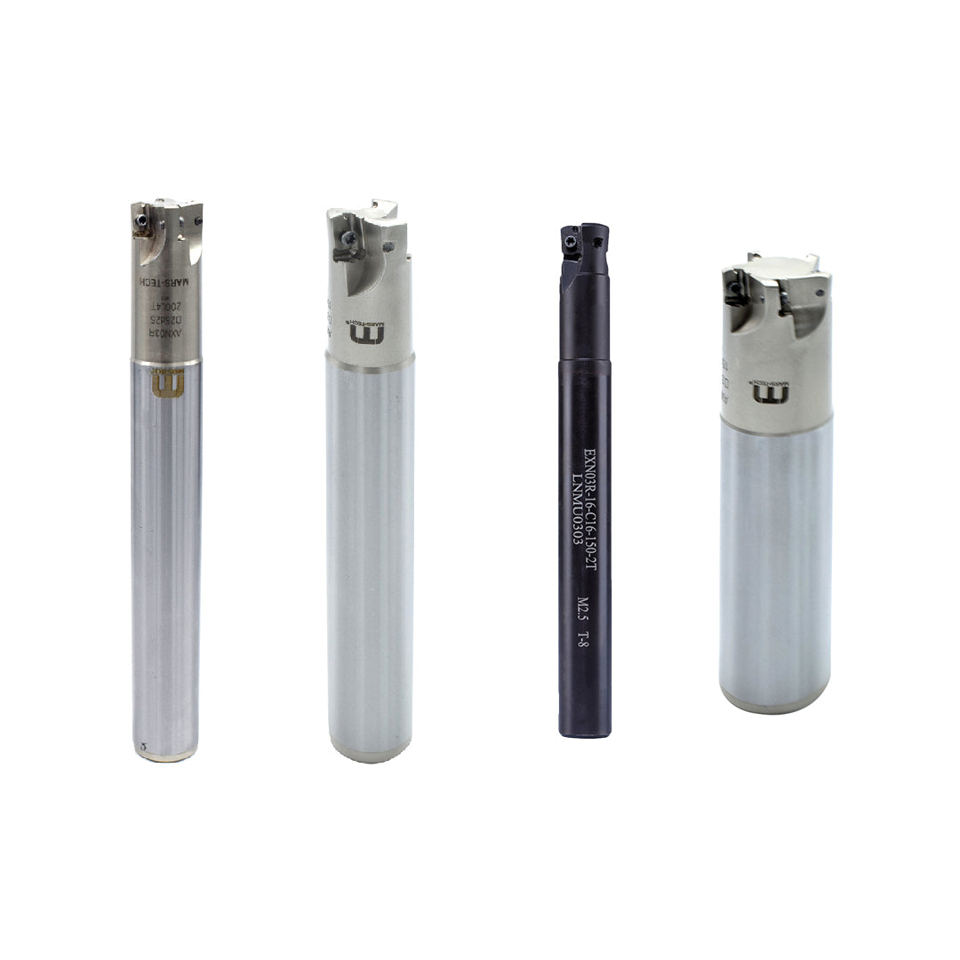 Set of four cylindrical metal tools