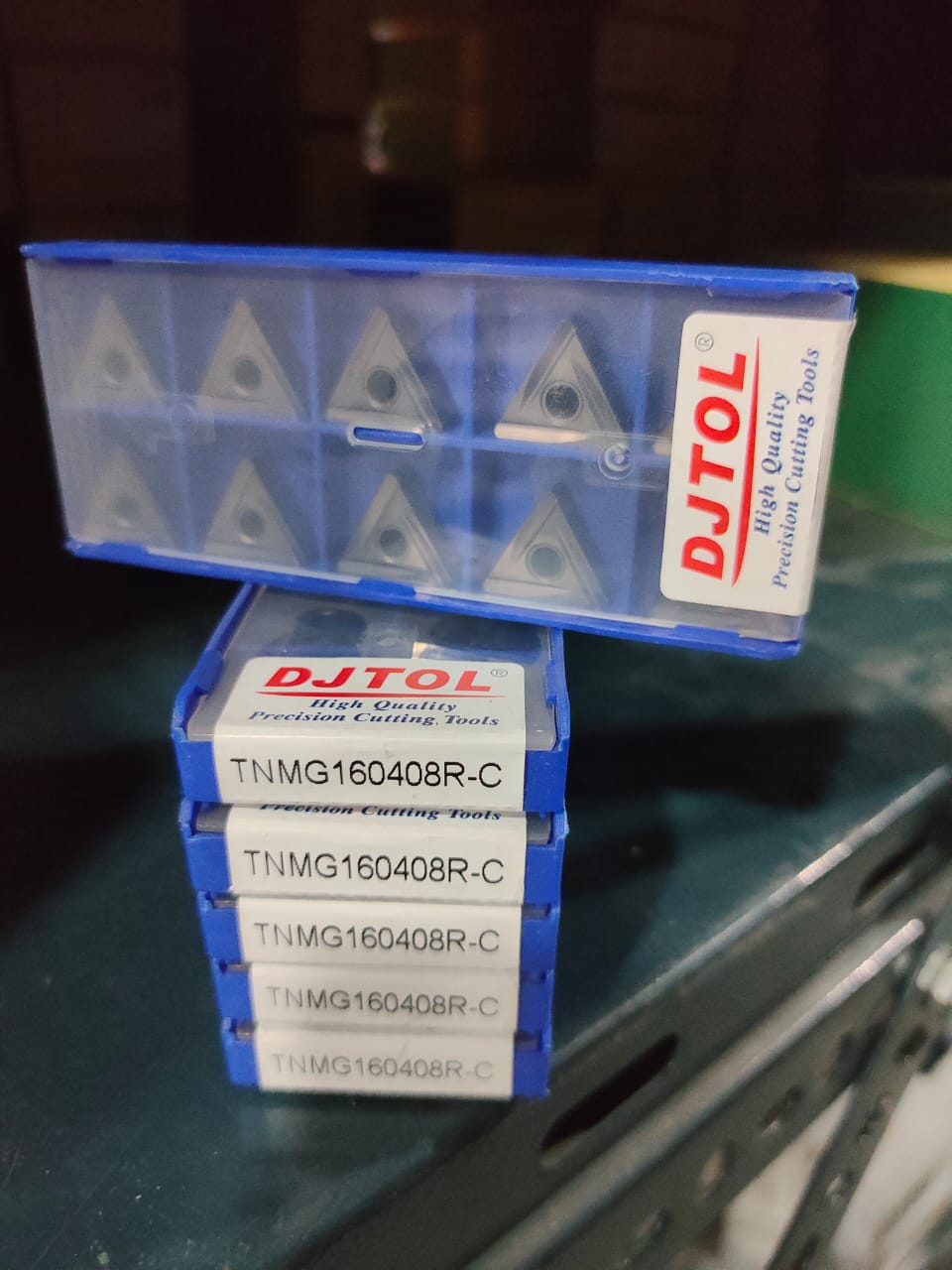 DUTOL metal cutting tools in a blue box