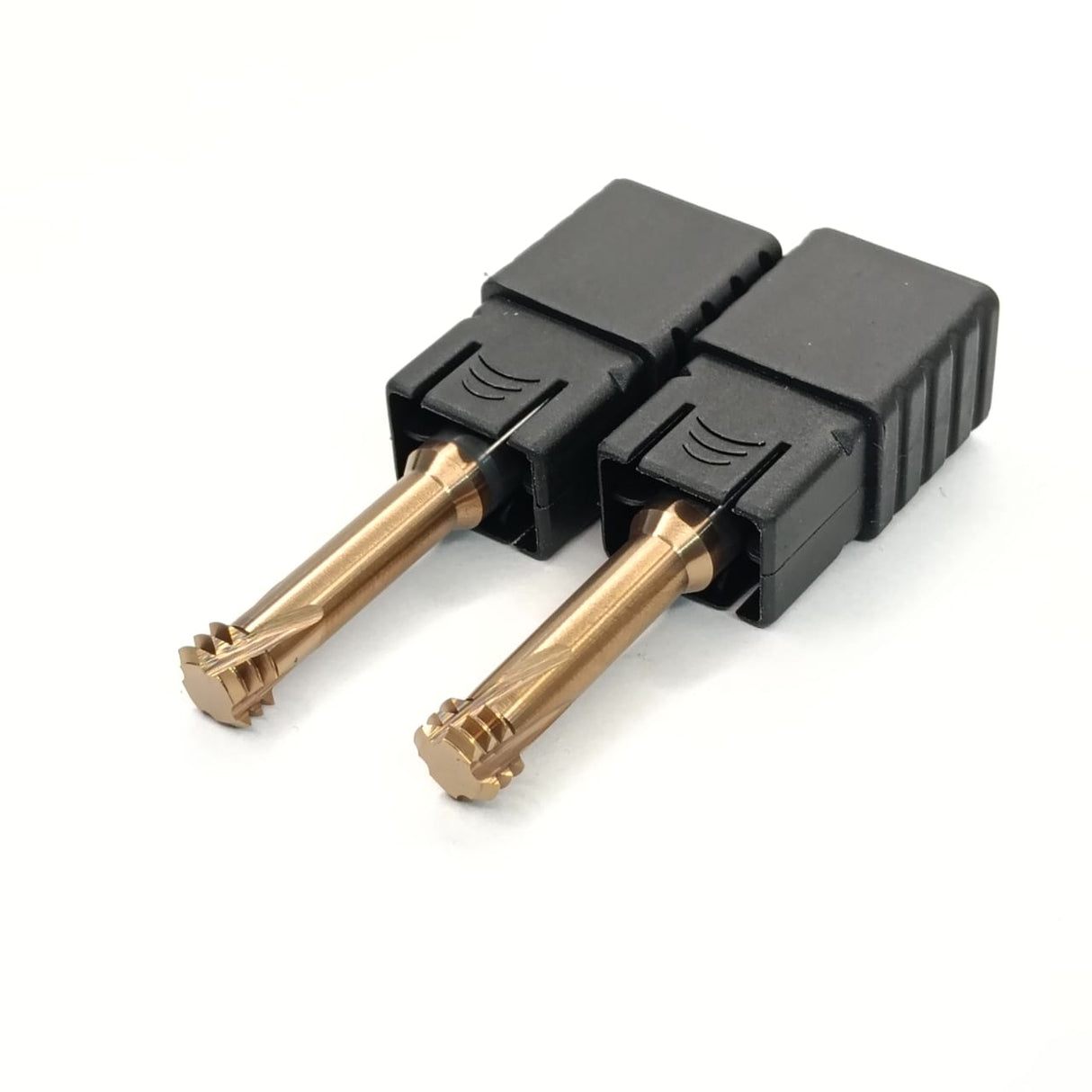 Two black connectors with gold ends