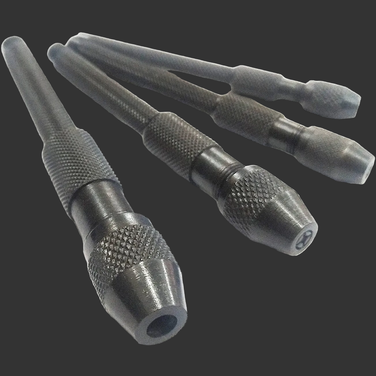 Four knurled steel tap