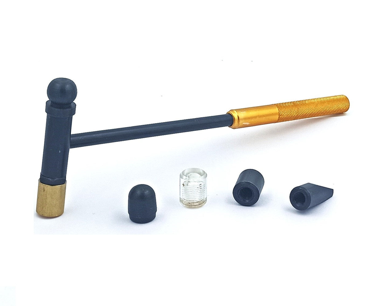 Paintless dent repair hammer with interchangeable knock down tips