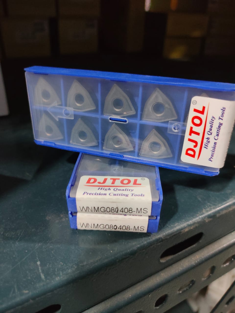Dental milling cutters in a blue case