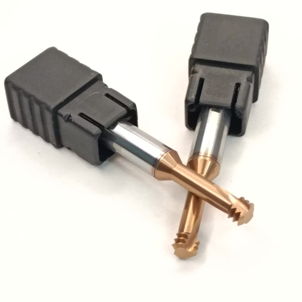 Two metal drill bits with black plastic handles