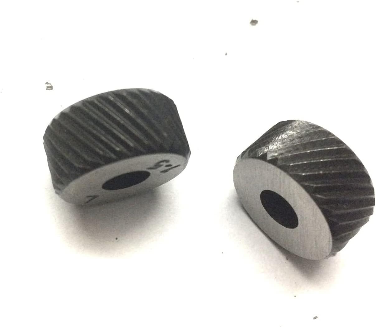 Two steel knurling wheels