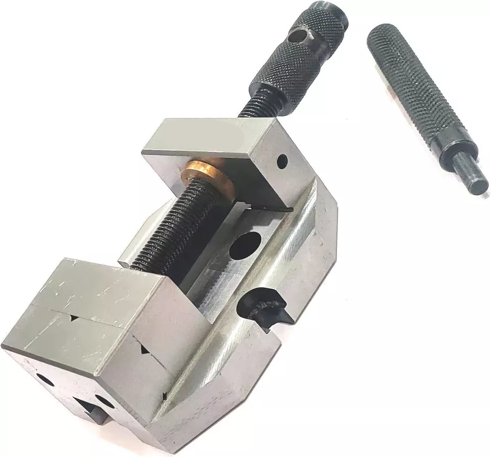 Rigid swivel base supports vertical milling slide for mini lathe