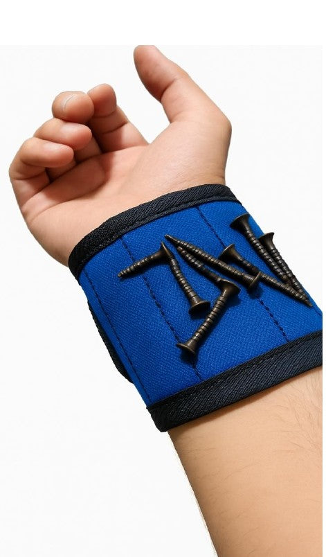 Hand wearing a blue wrist