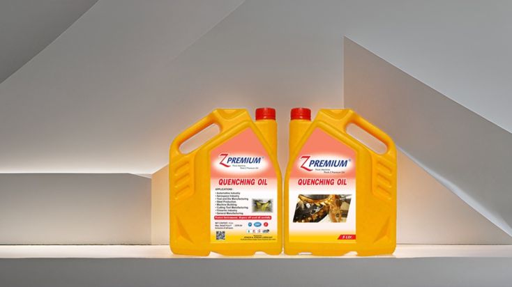 Two yellow oil containers with labels