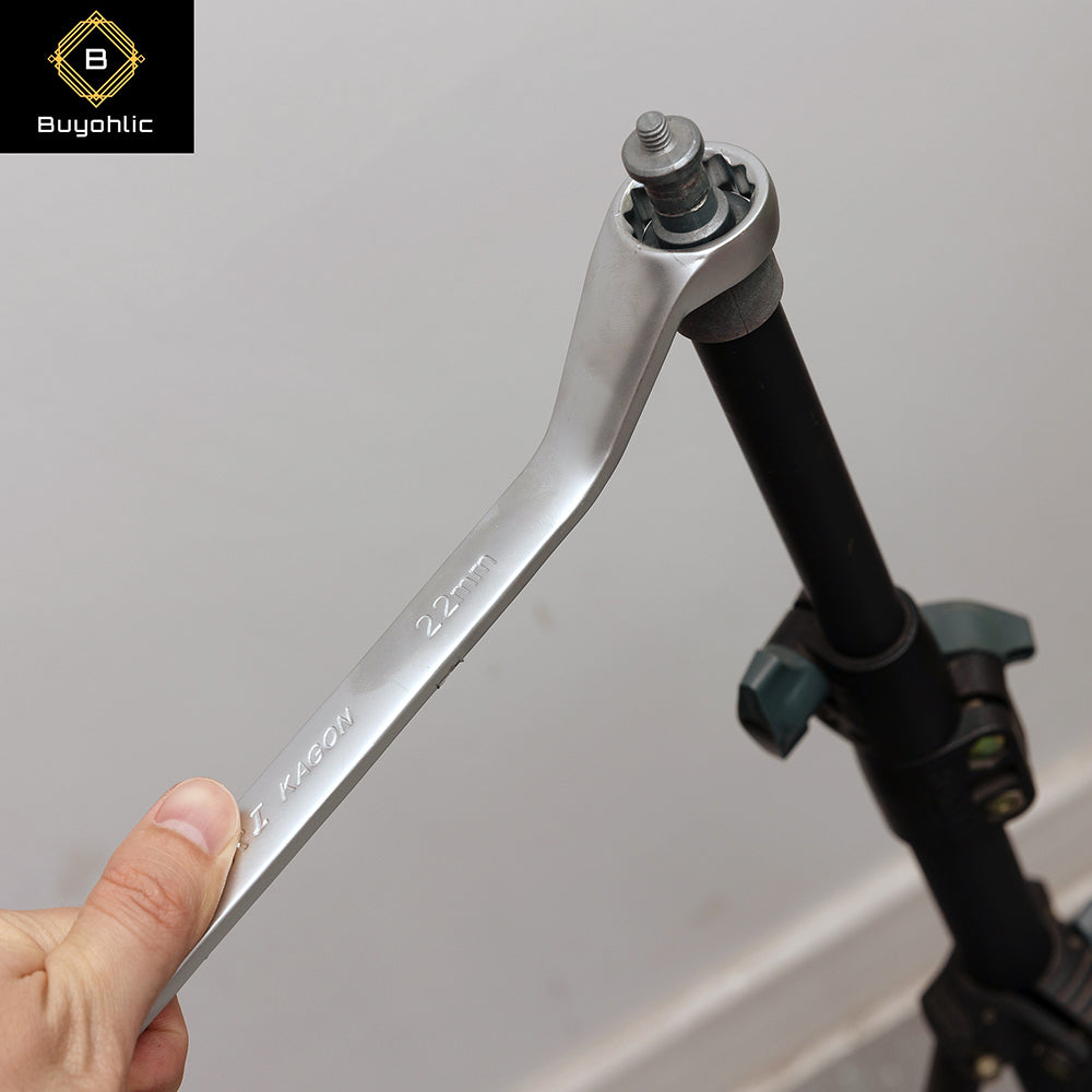Hand Holding Offset Ring Spanner Wrench