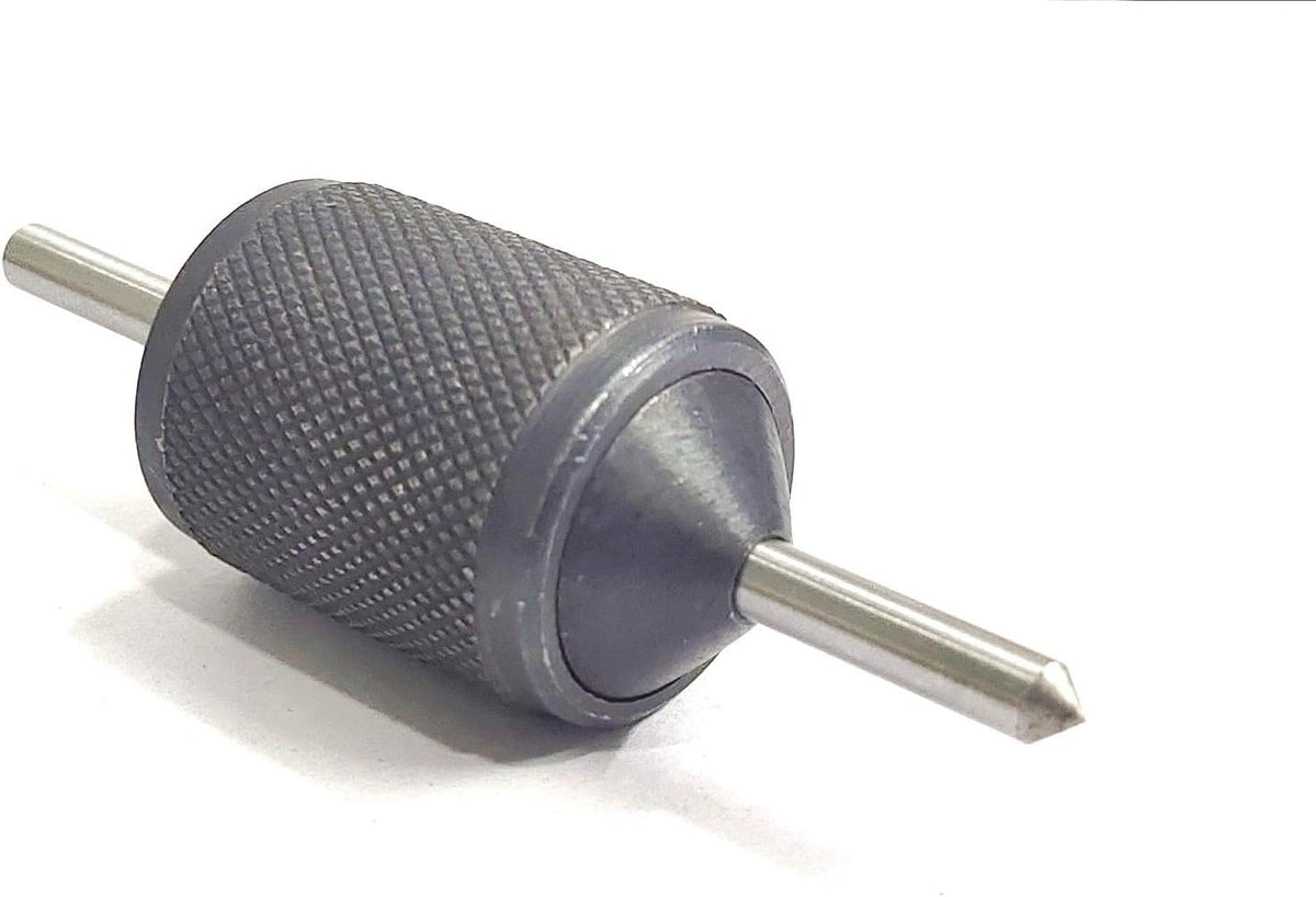 Large universal transfer punch with knurled guide sleeve