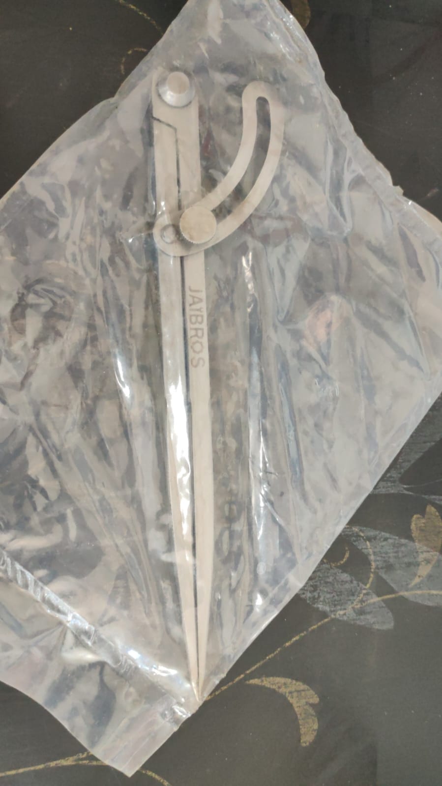 Stainless steel divider