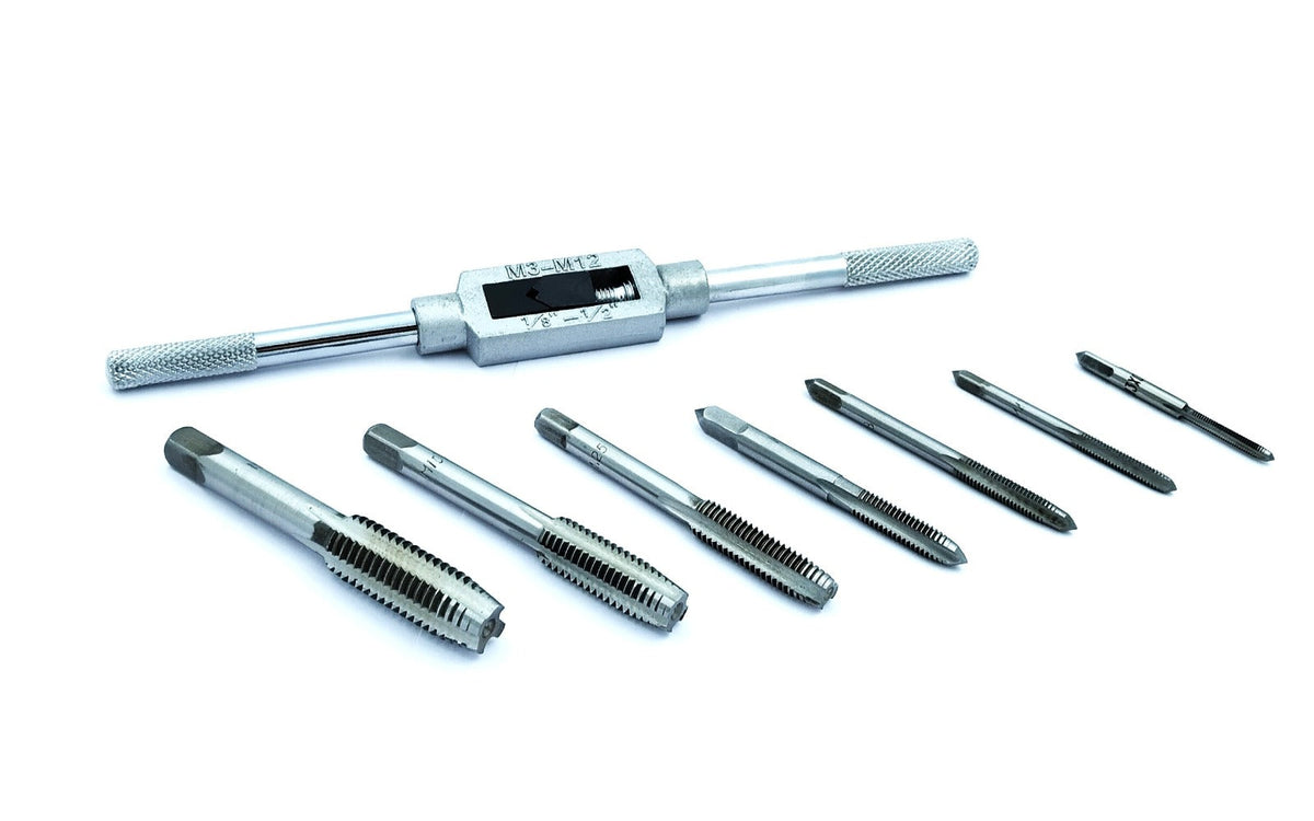 Set of metal thread taps isolated
