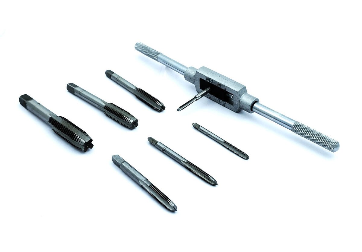 Set of metal threading tools isolated