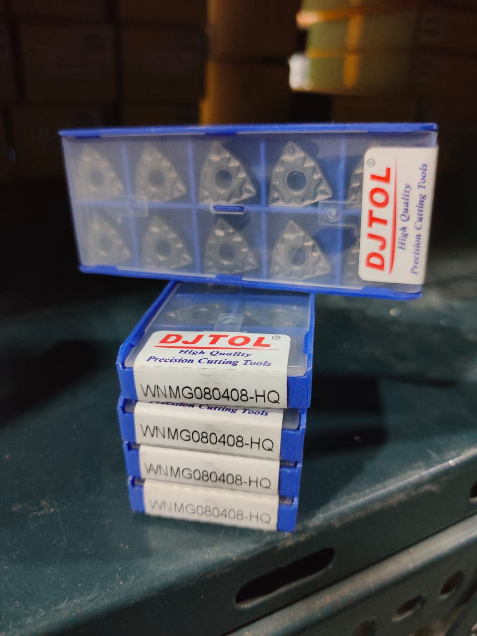 Stack of DJTOL cutting tool boxes