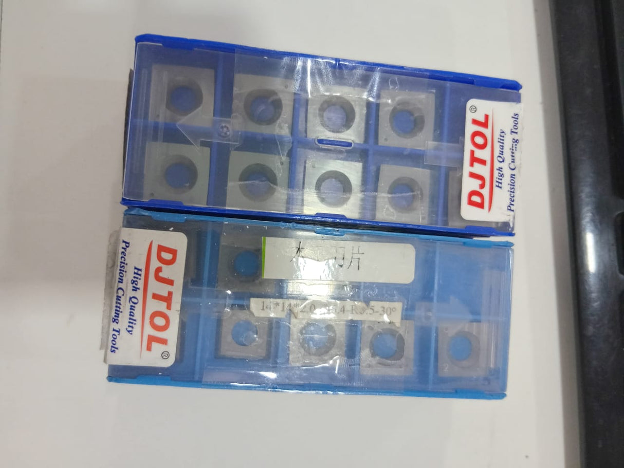 Two packages of Dutol cutting tools