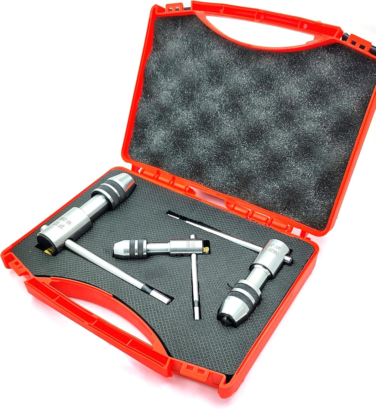 Set of 3 ratcheting T-handle tap wrenches arranged in open red protective case