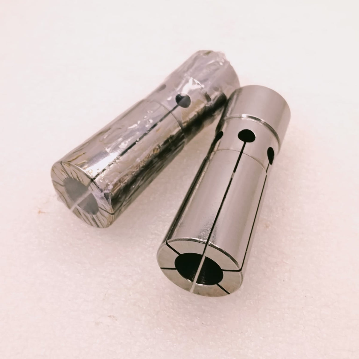 Two metal collets