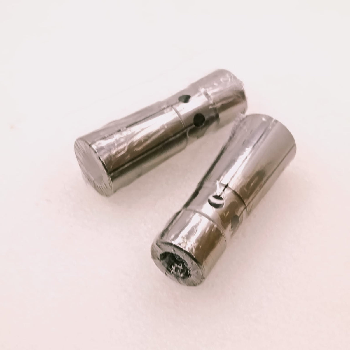 Two metal collets