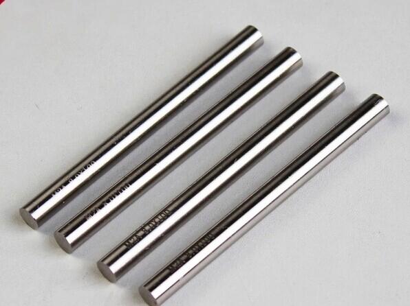 Four polished metal rods