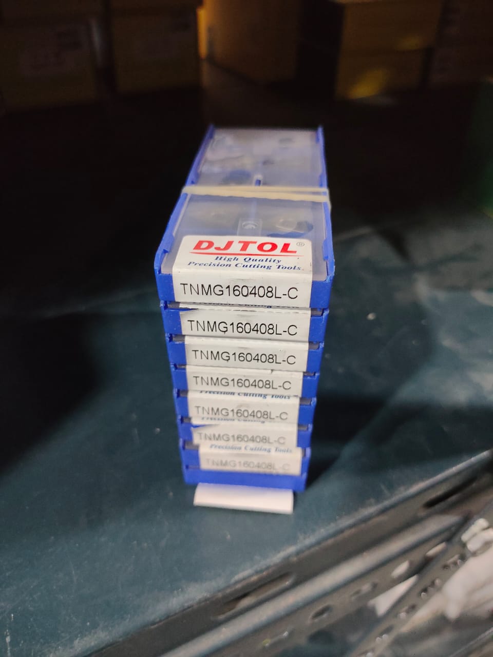 Box of DJTOL-branded components