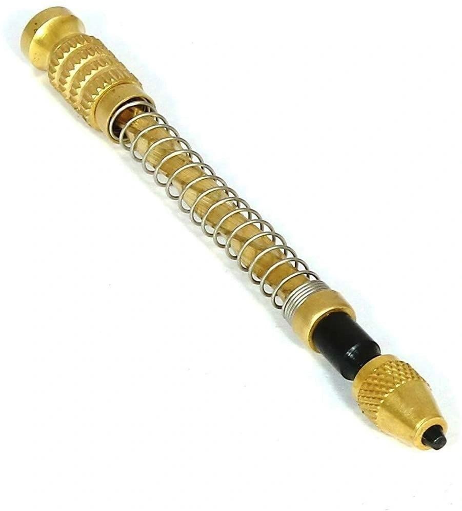 Brass tool with coiled spring