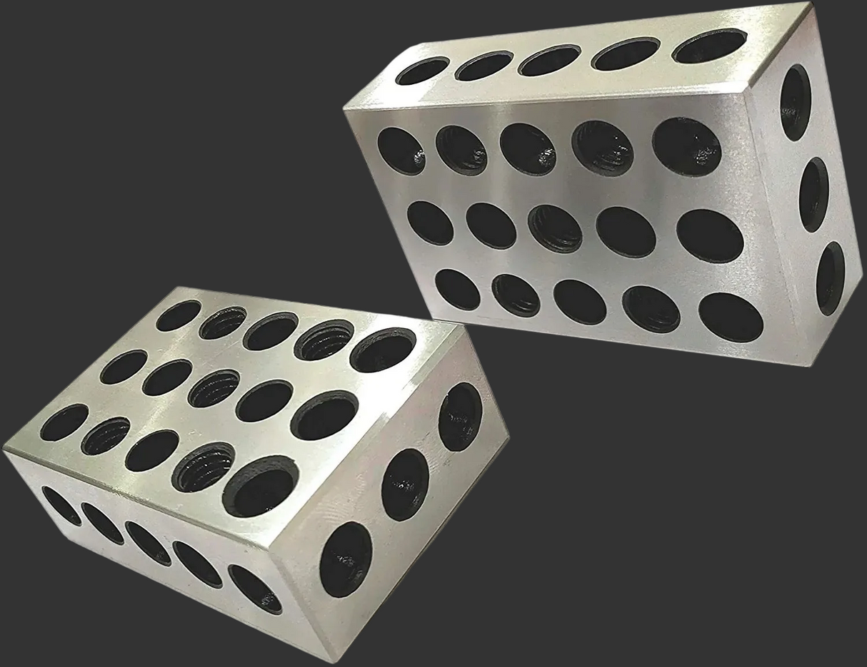 Two perforated metal blocks