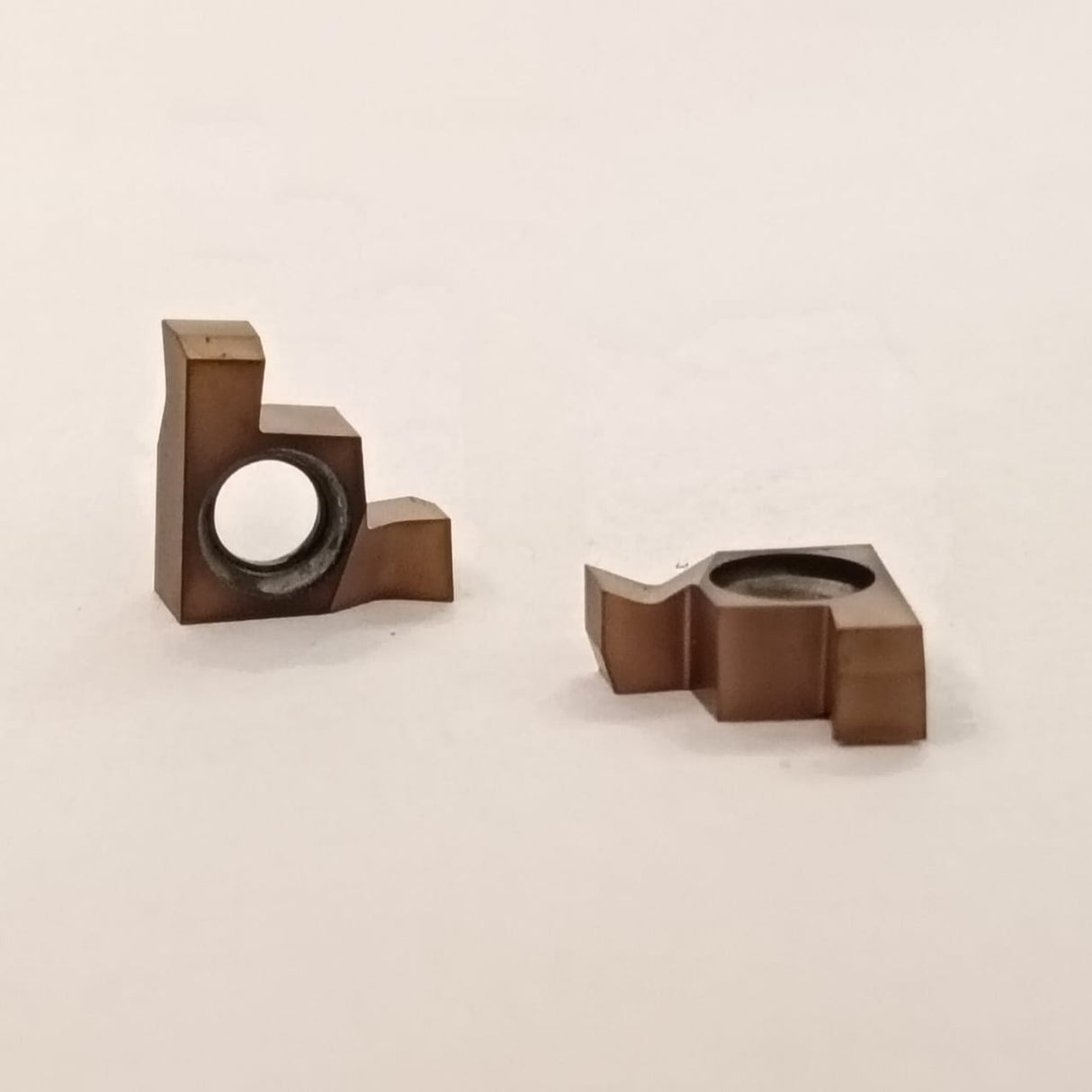 Two metallic mechanical components