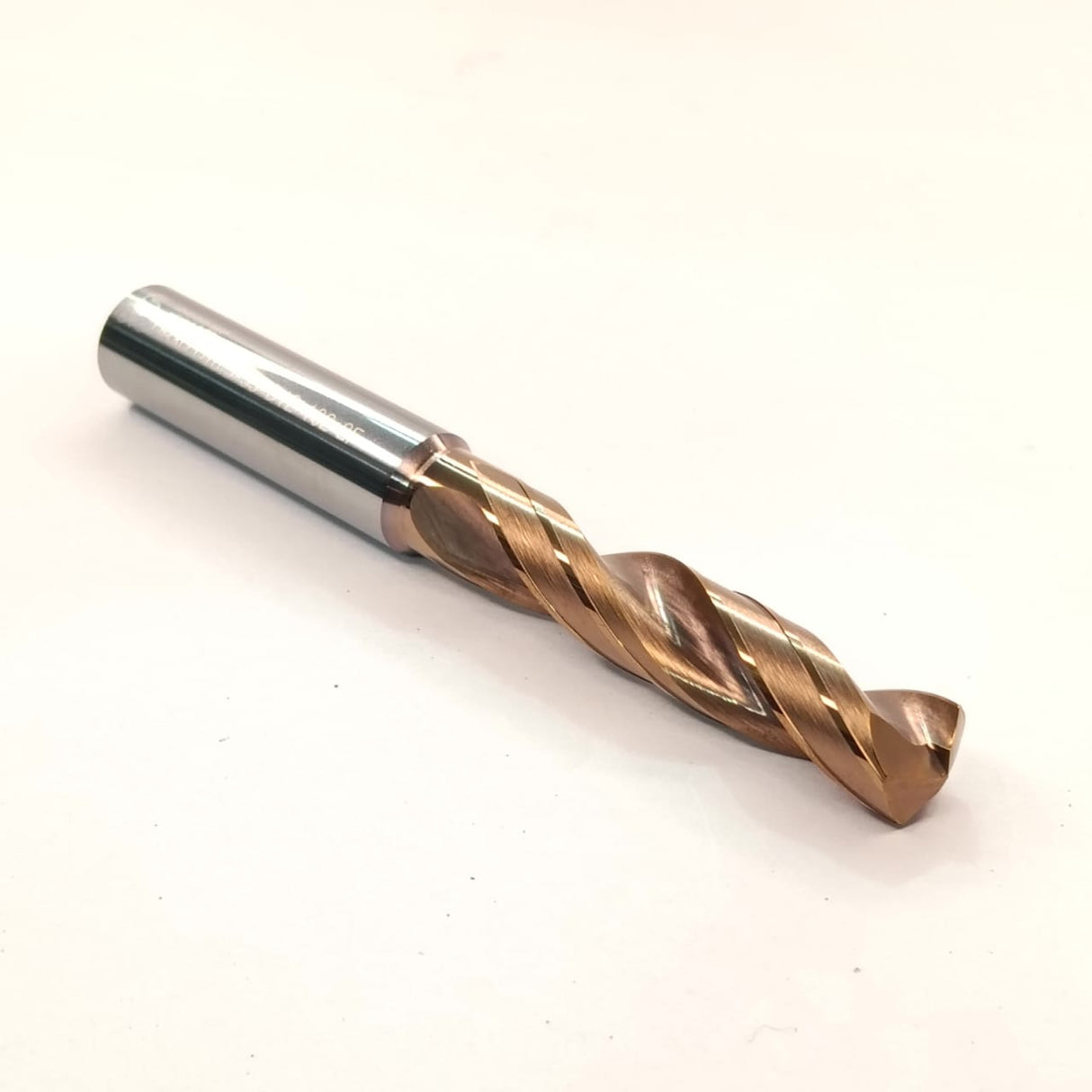 Drill bit with metallic finish
