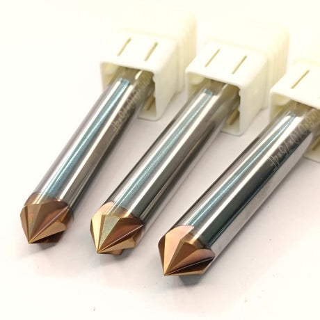 Three metal drill bits