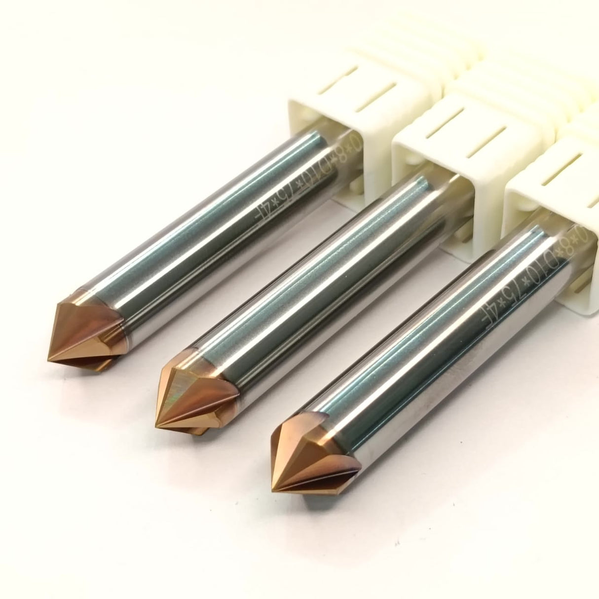 Three metal drill bits
