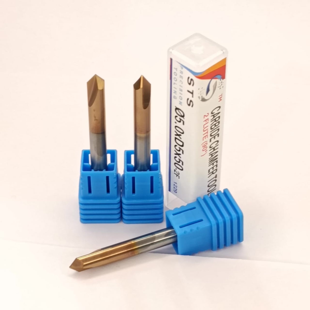 Two carbide drill bits in blue holders