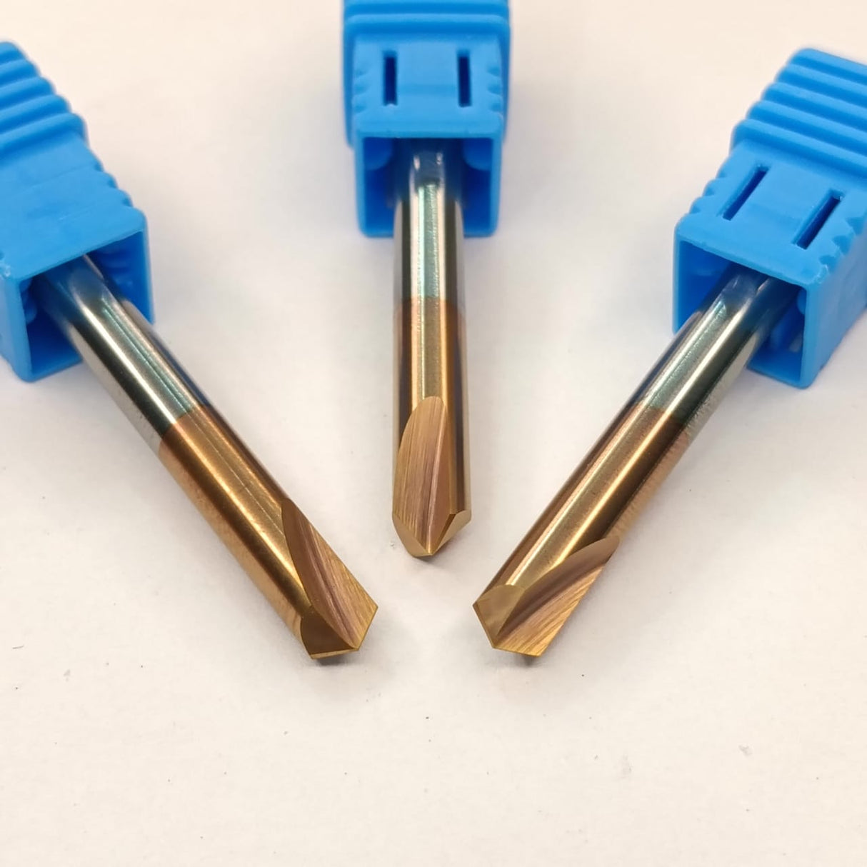 Three metal drill bits