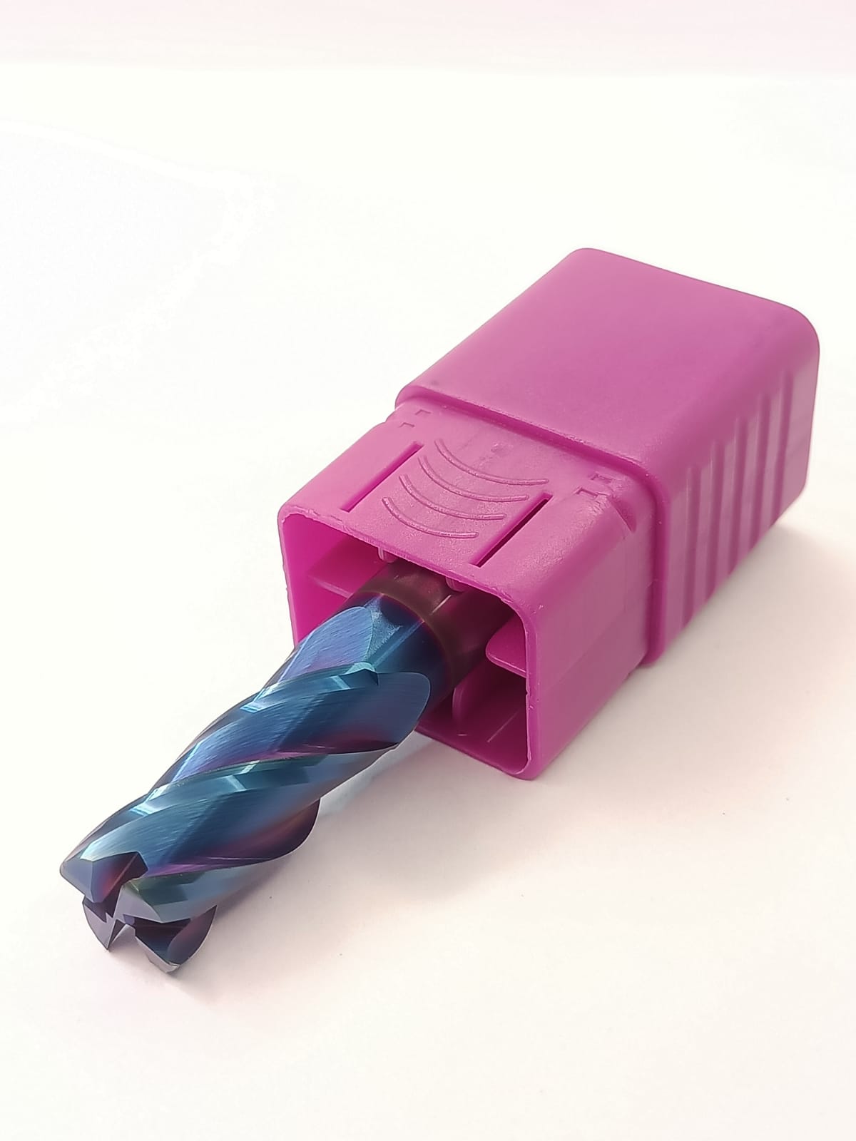 Pink drill bit holder with a blue drill bit