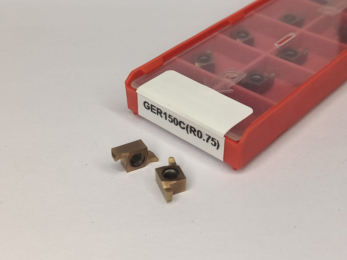 Metal cutting inserts with a red tool holder