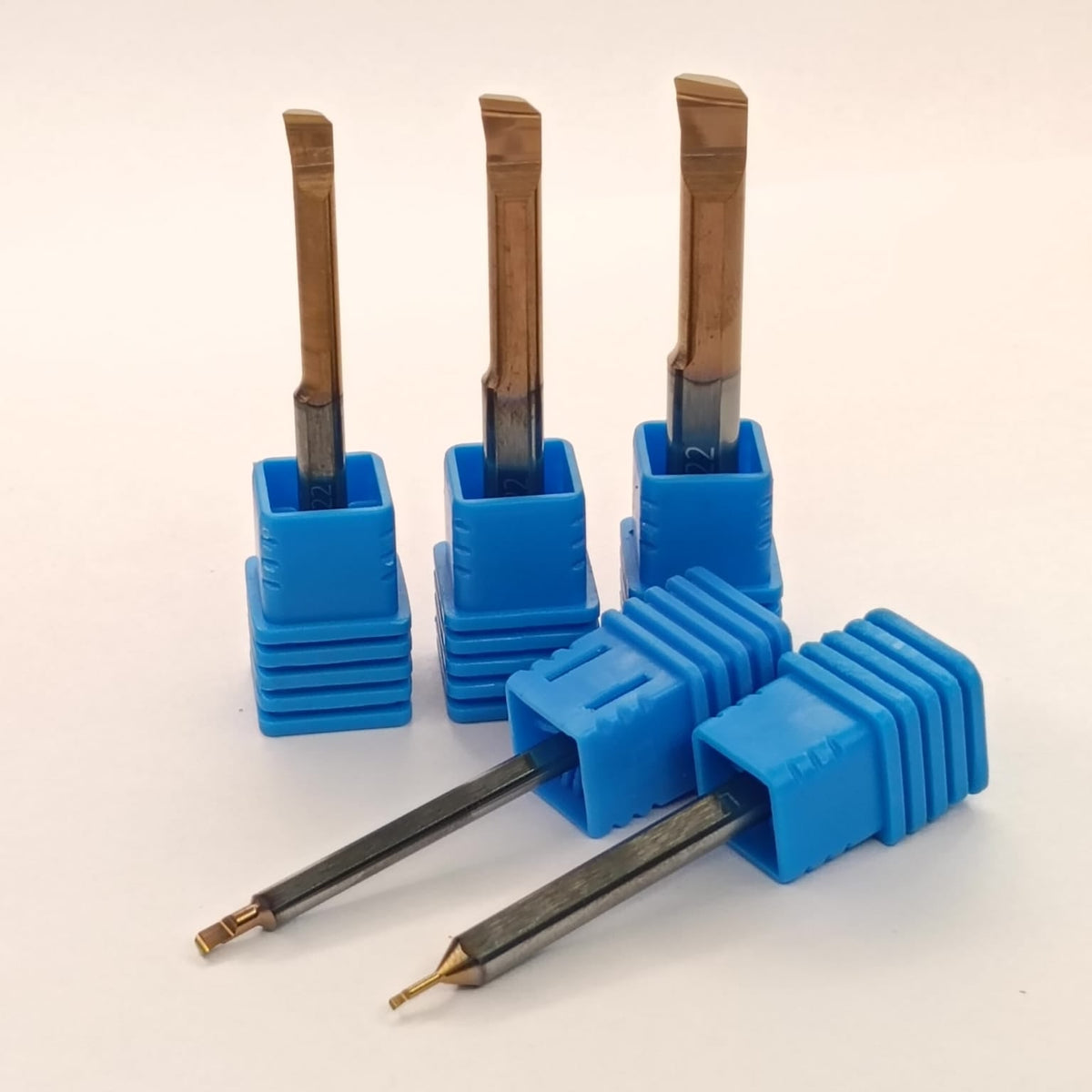 Set of metal tools with blue plastic holders