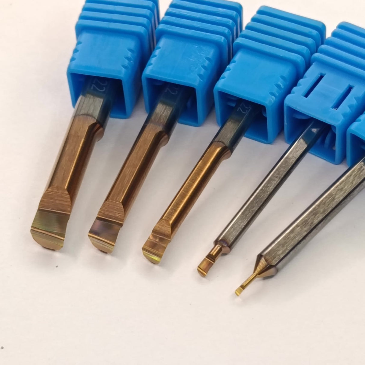 Set of metal drill bits with blue plastic handles
