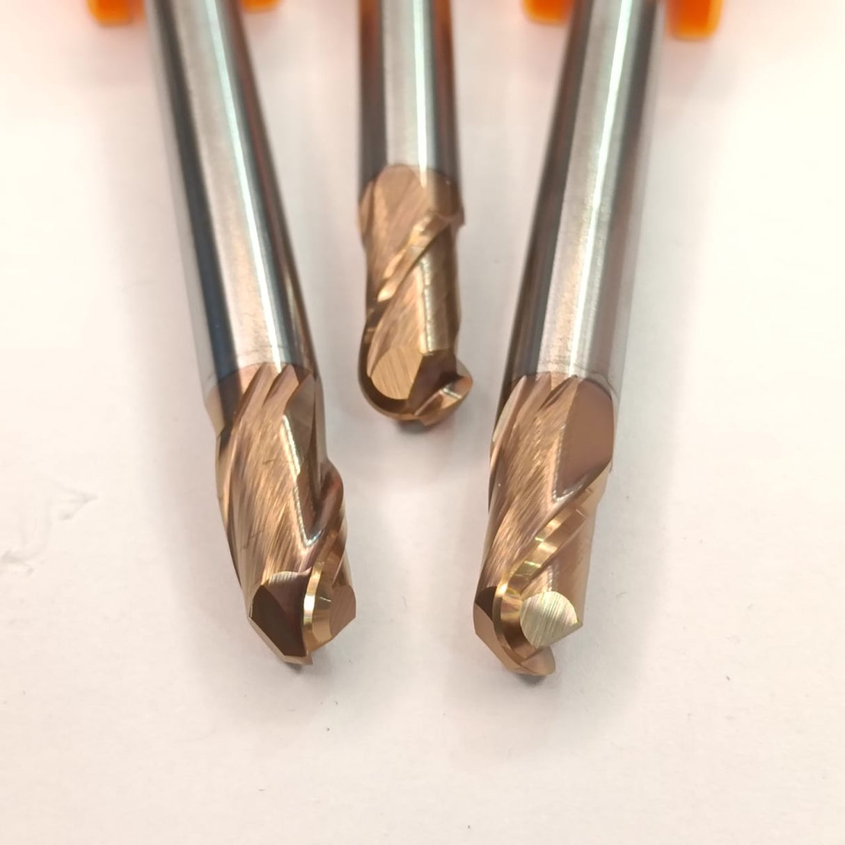 Three metal drill bits