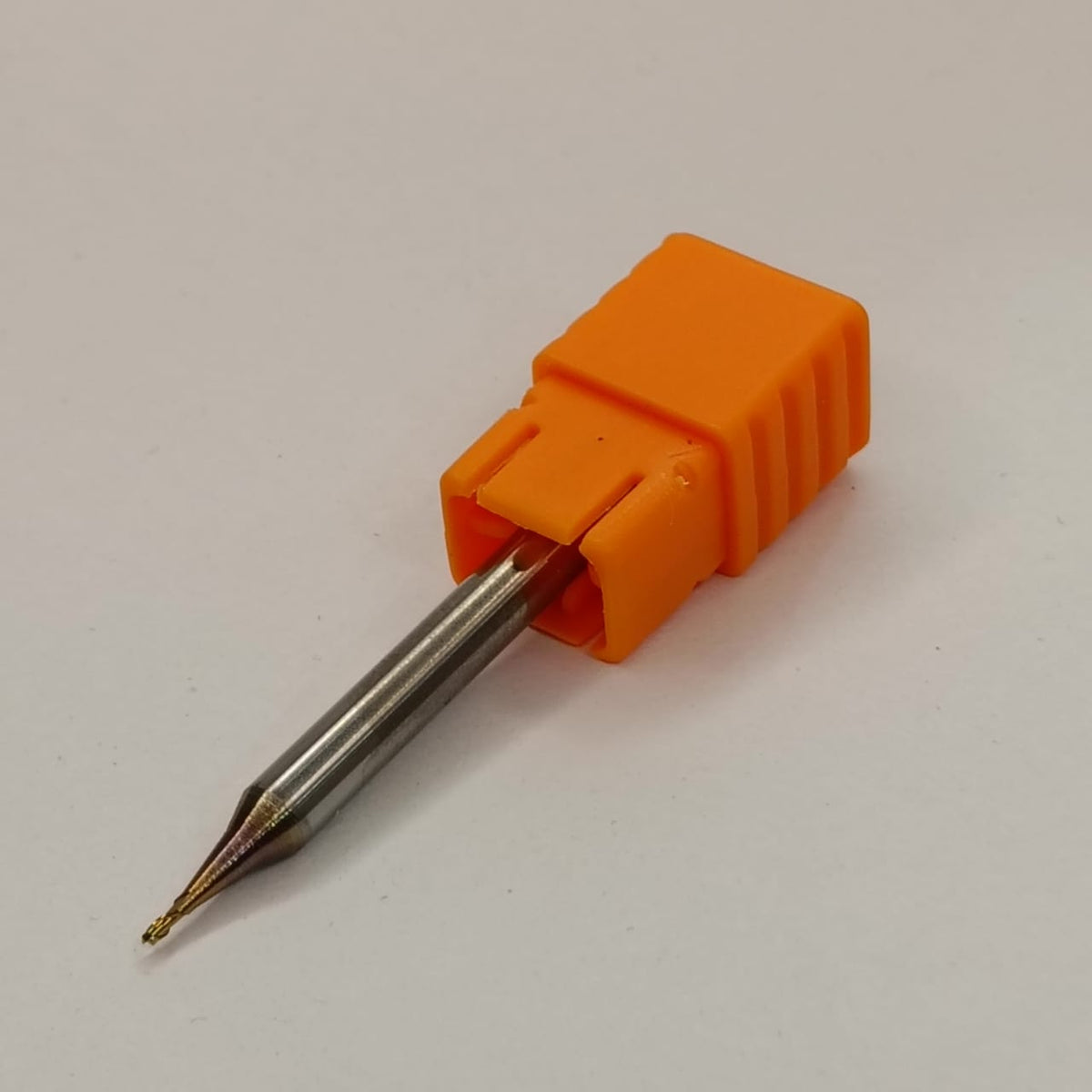 Orange drill bit