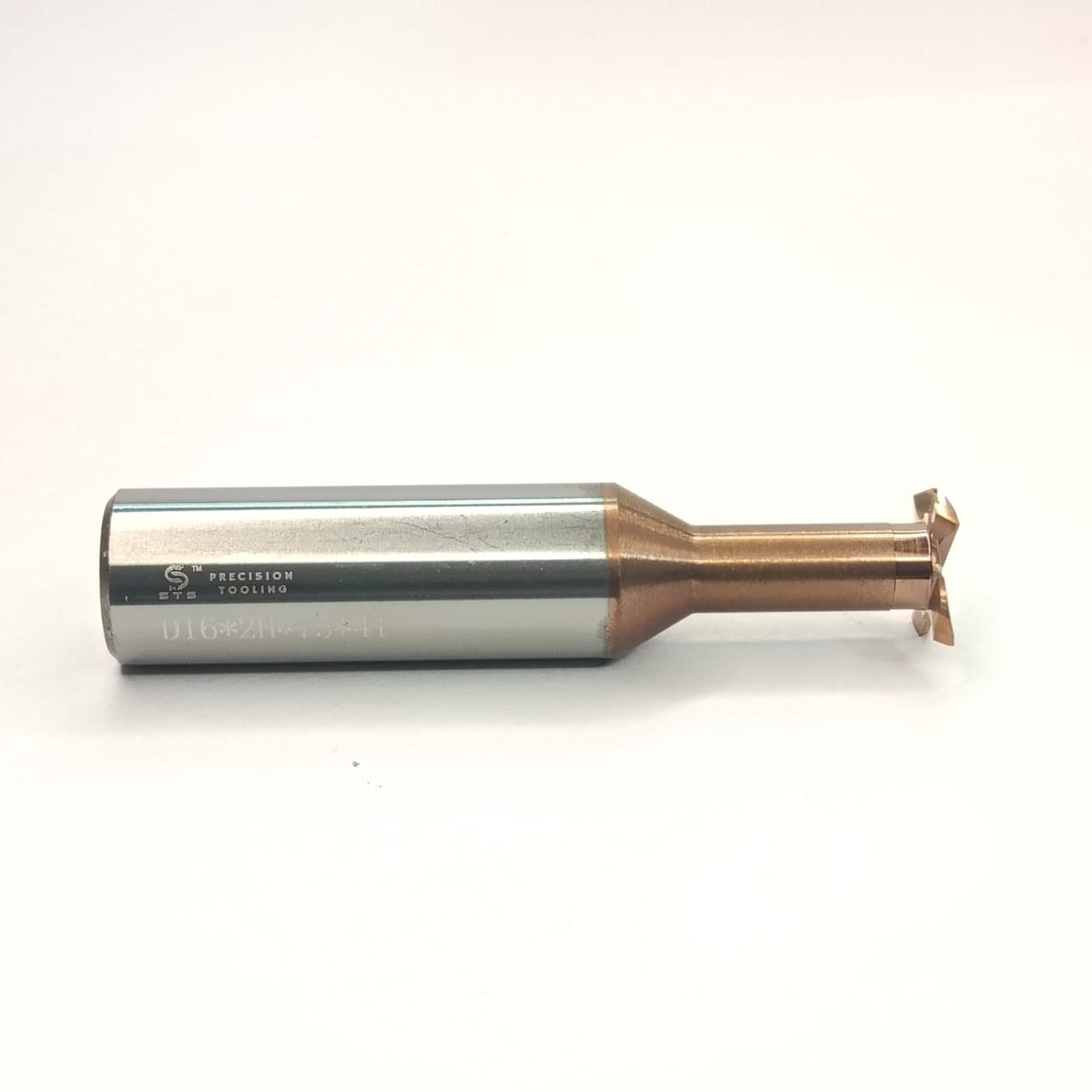 Metal cutting tool with copper and silver design