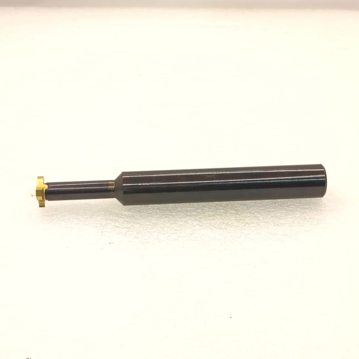 Small black metal measuring probe