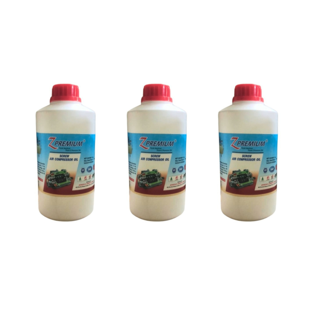 Three bottles of Z-Premium air compressor oil