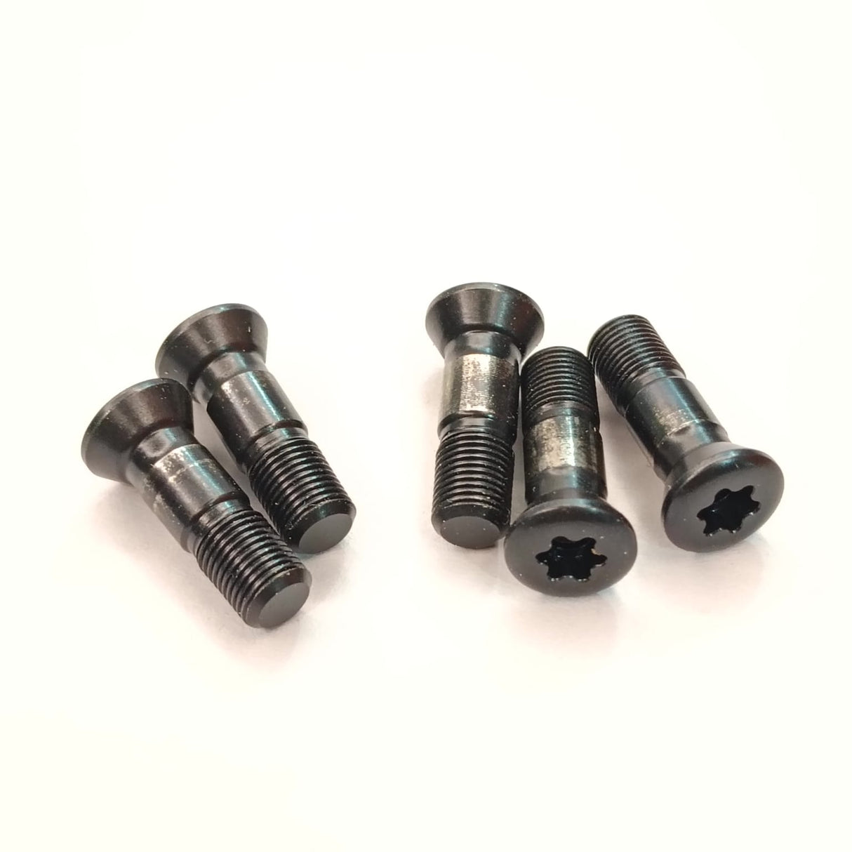 Five black Torx insert screws