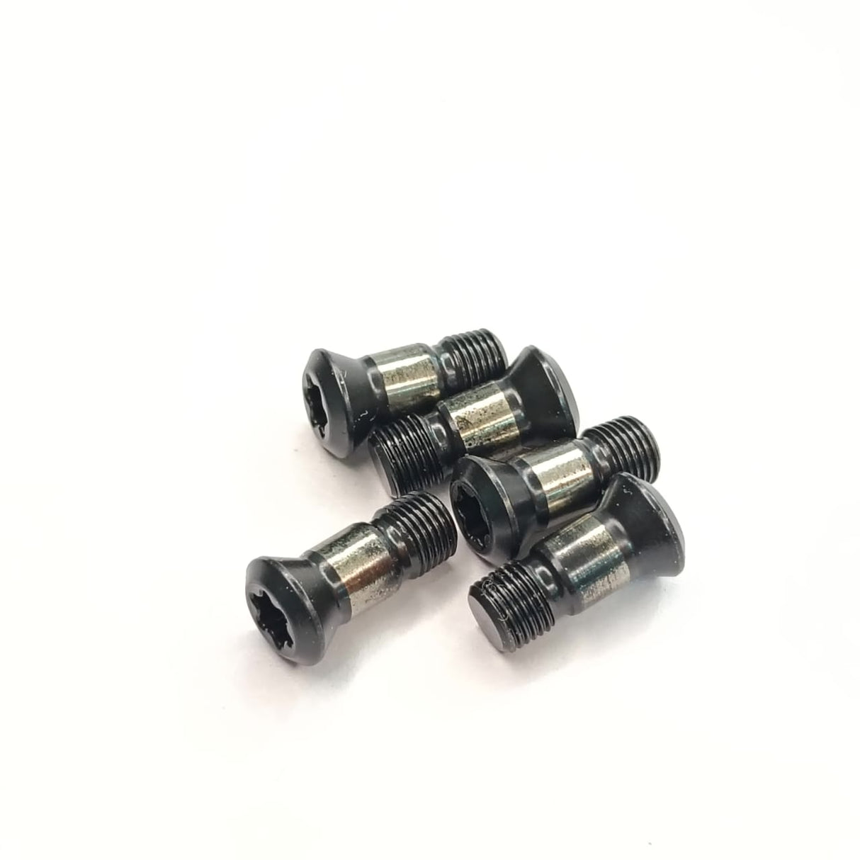 Five black carbide insert screws