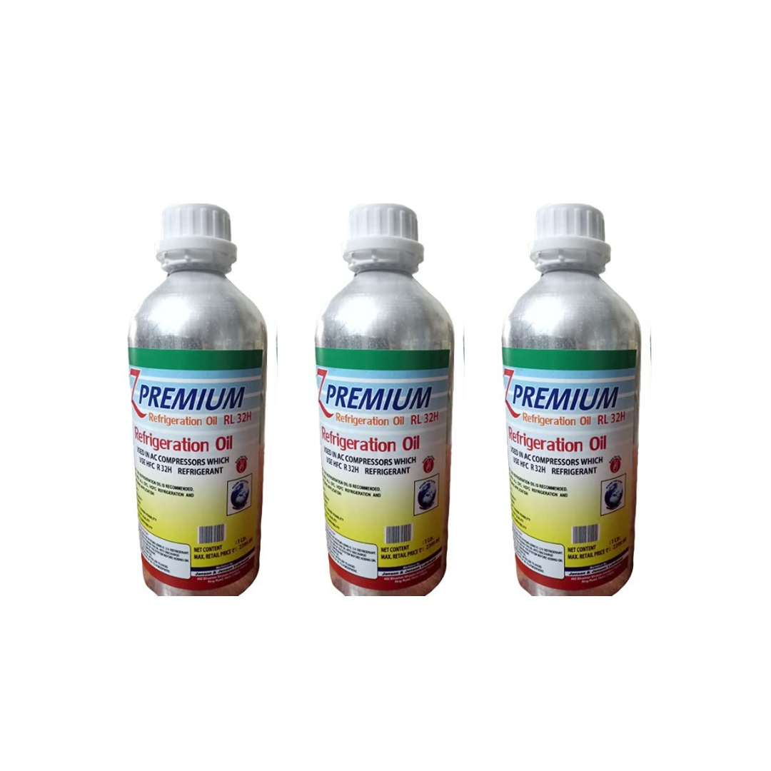 Three bottles of premium refrigeration oil