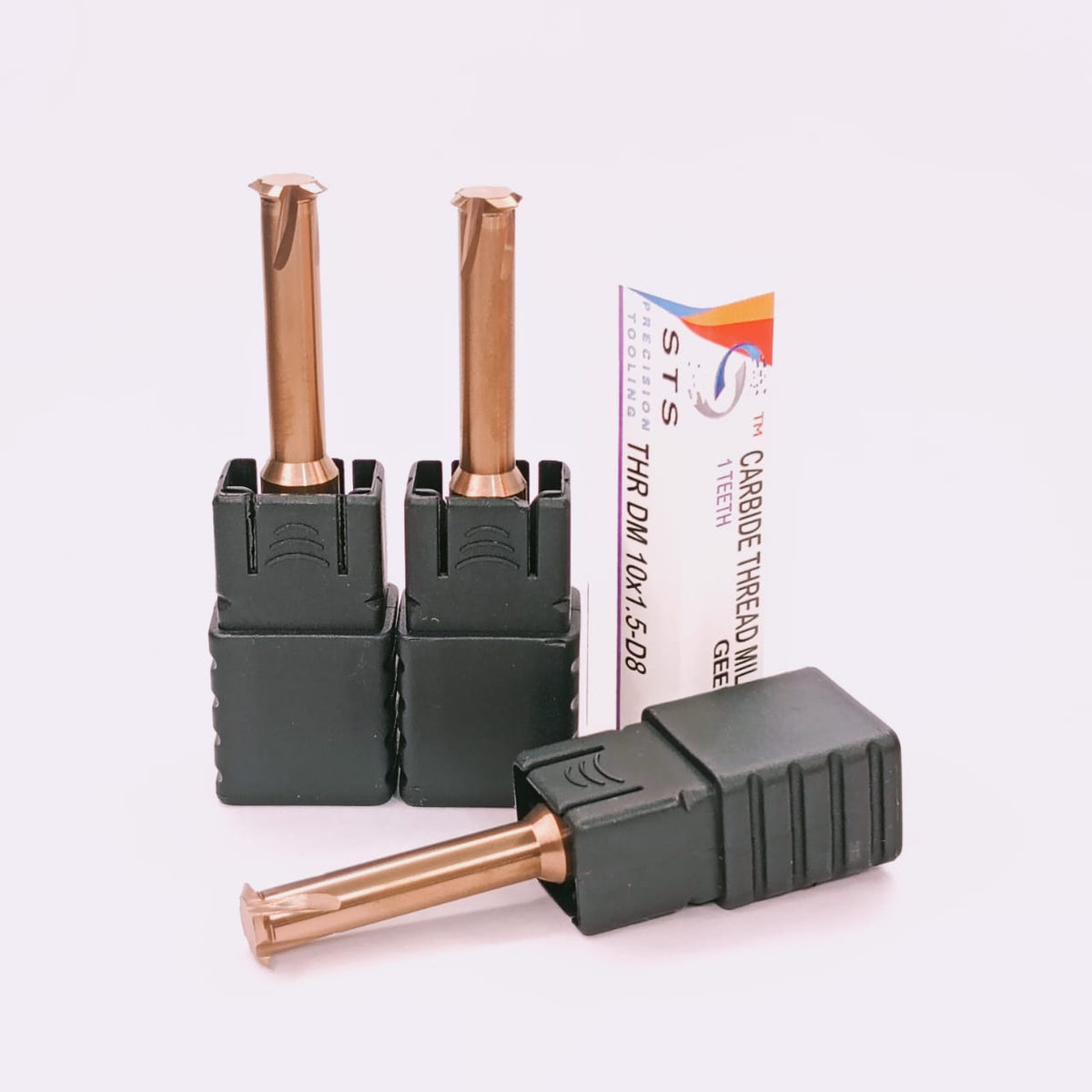Three cylindrical metal tools