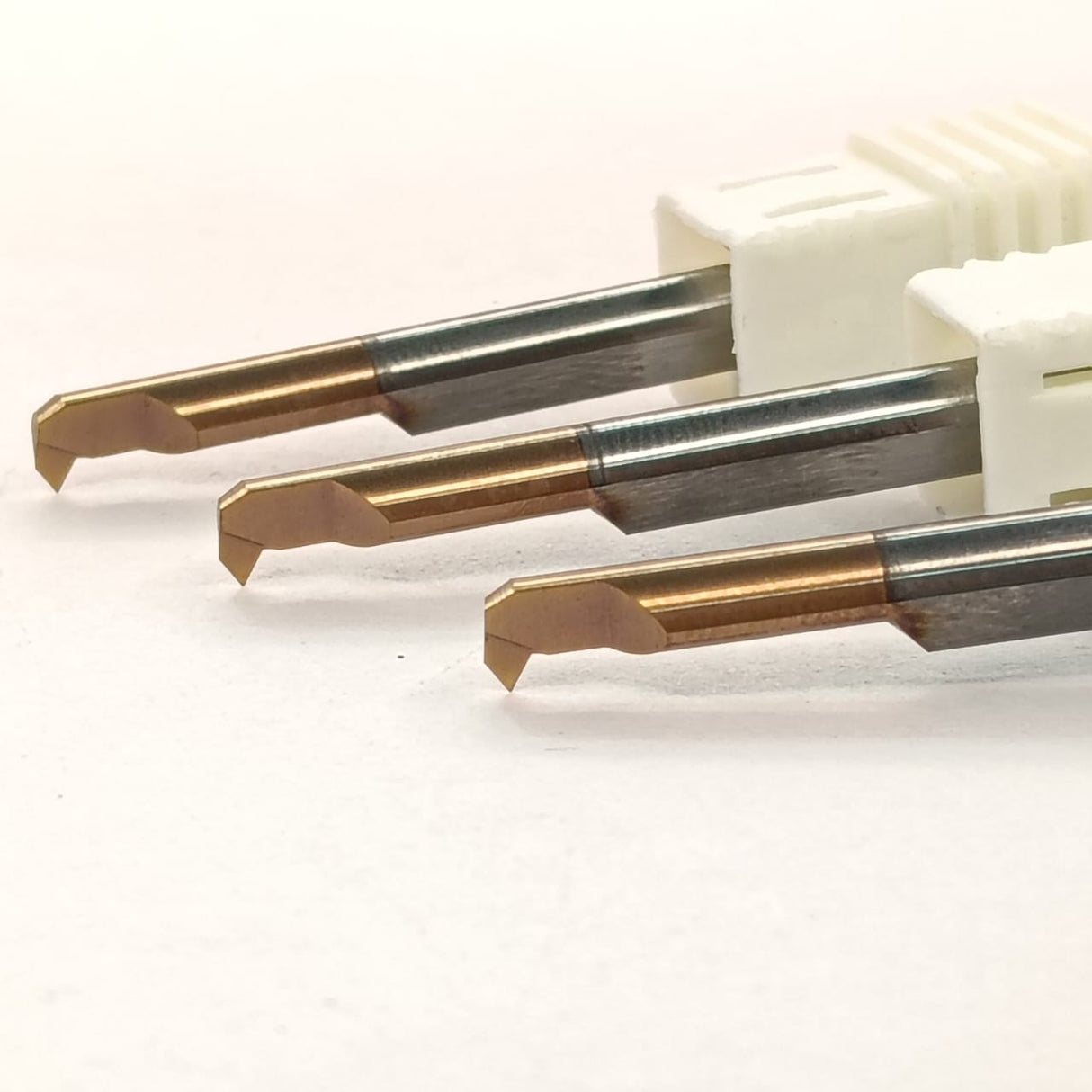 Three metal drill bits