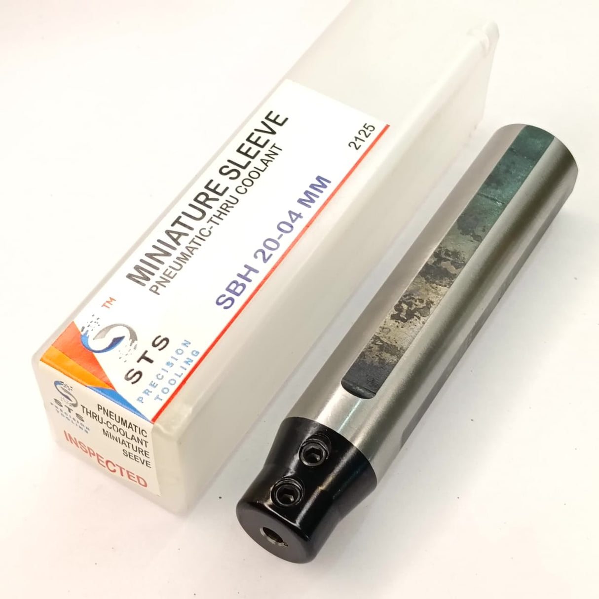 Metallic cylindrical component with packaging labeled