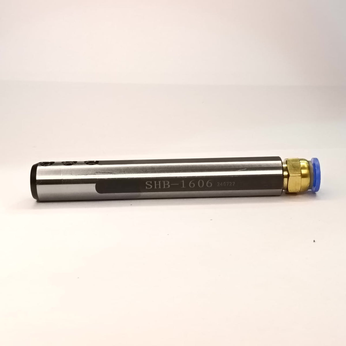 Metallic cylindrical object with 'SHB-1606