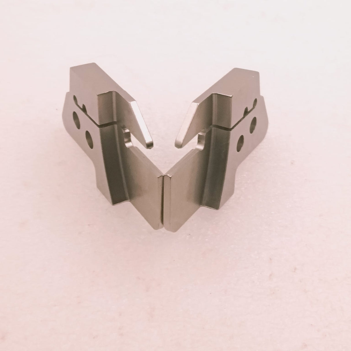 Metallic V-shaped object