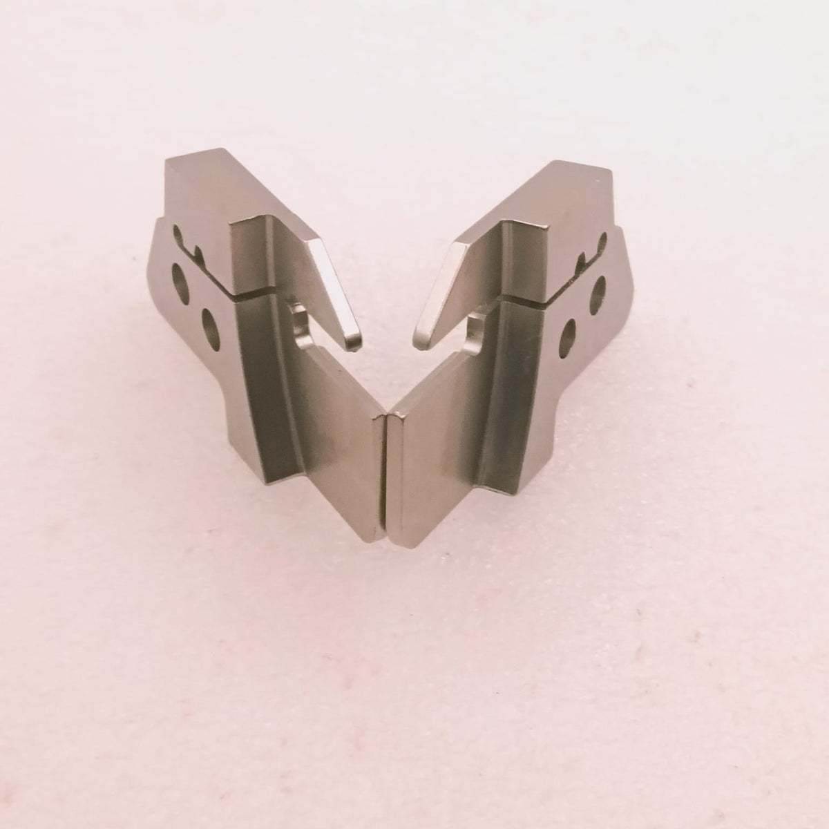 Metallic V-shaped object