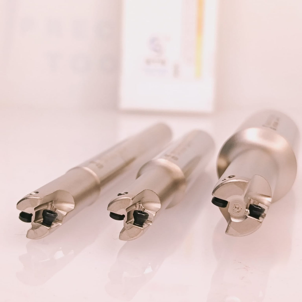 Three metallic tools